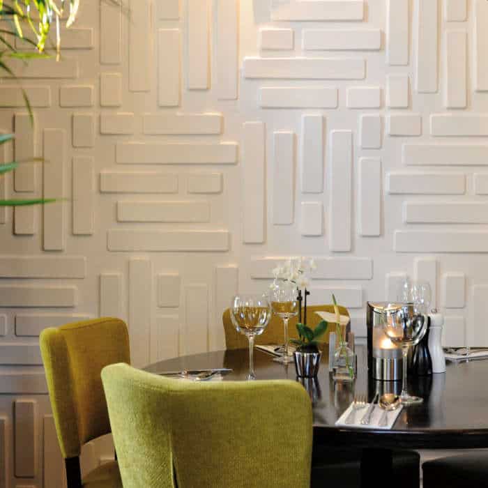 panou decorativ din fibra de trestie de zahar de culoare alba in living